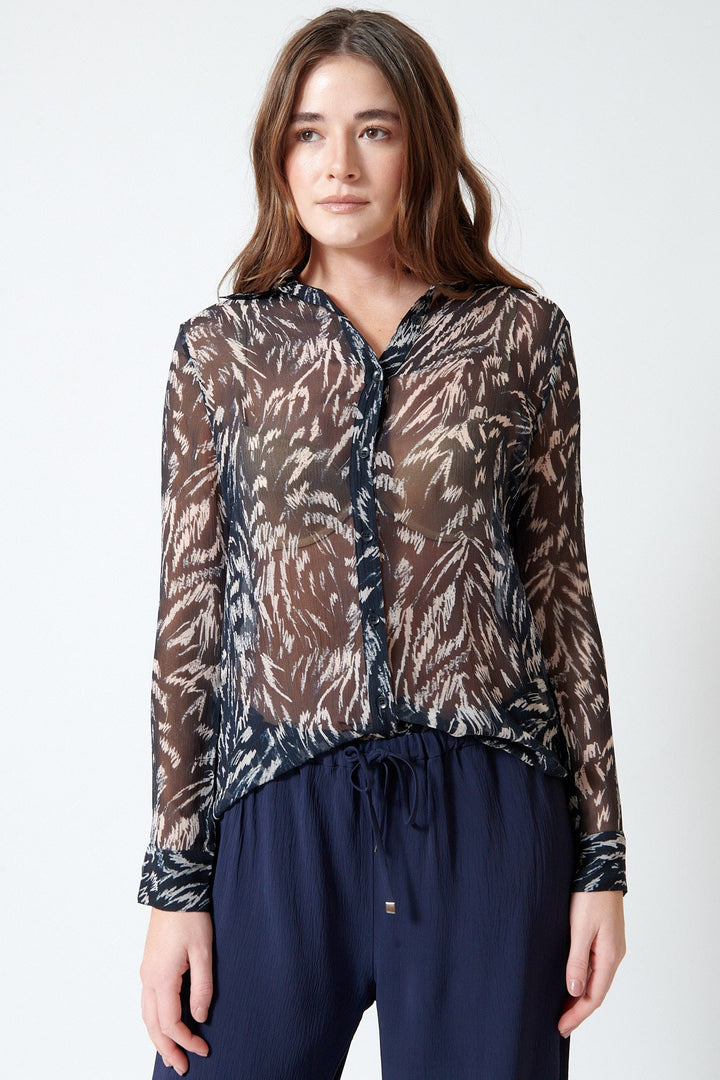 Julia wearing Apiece Apart Alva Button Up front view