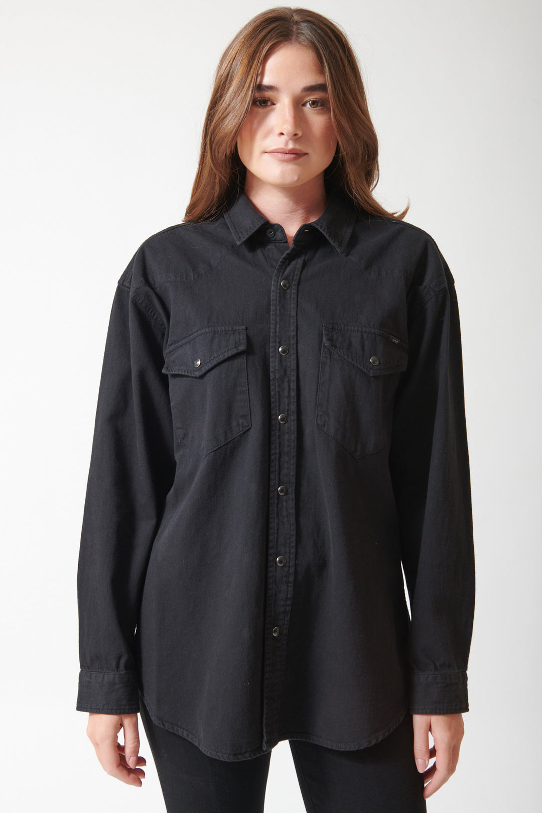 Julia wearing Mother The Exes And Ohs in Black, front view.