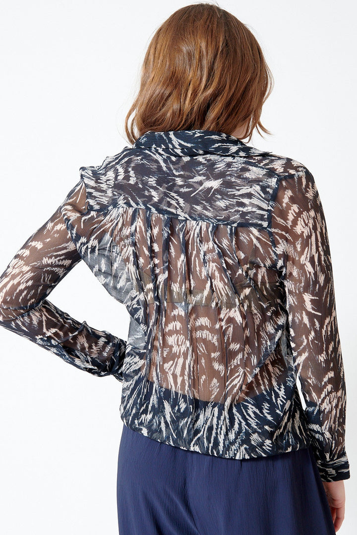 Julia wearing Apiece Apart Alva Button Up rear view