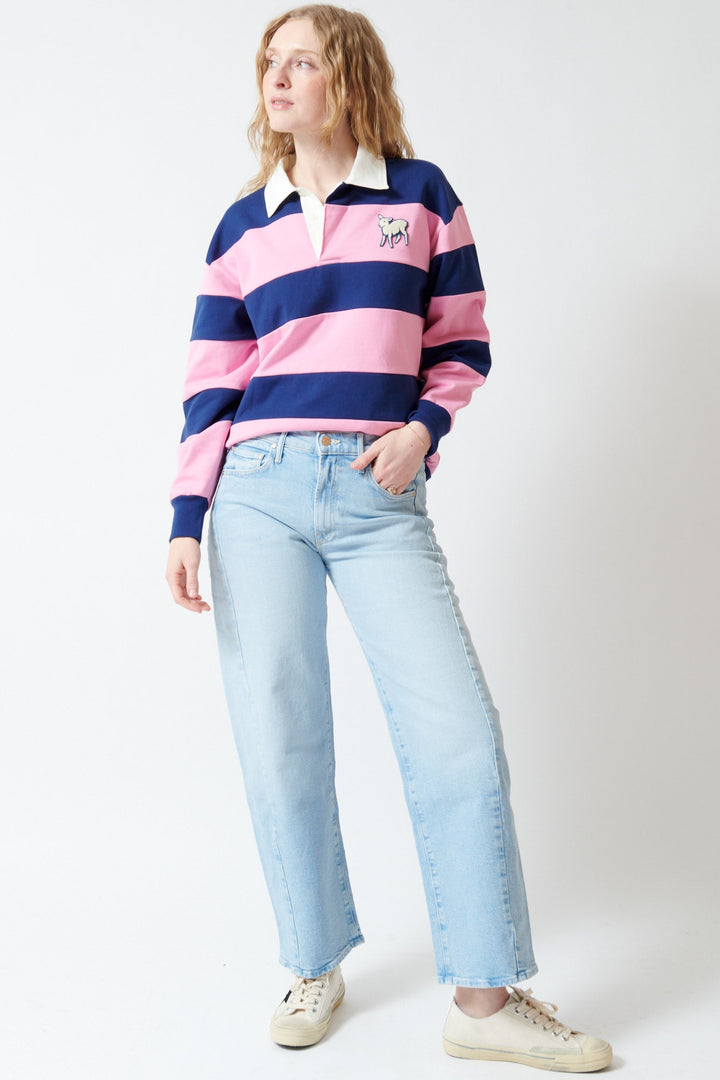 Madi wearing Mother Denim The Mid Rise Half Pipe Hover front view