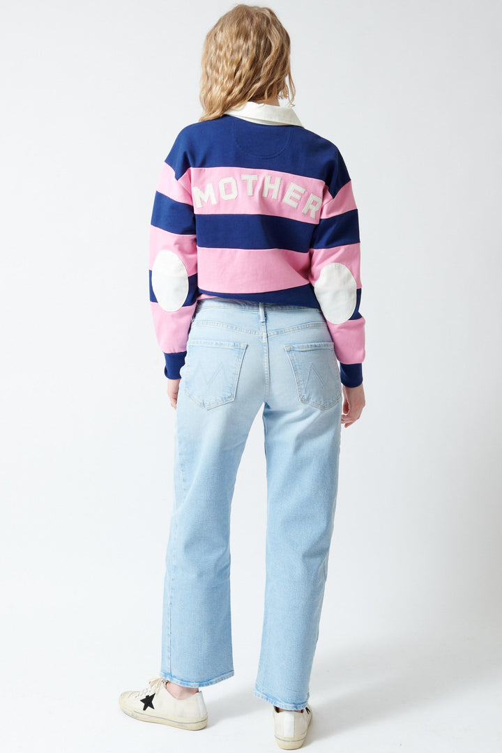 Madi wearing Mother Denim The Mid Rise Half Pipe Hover rear view