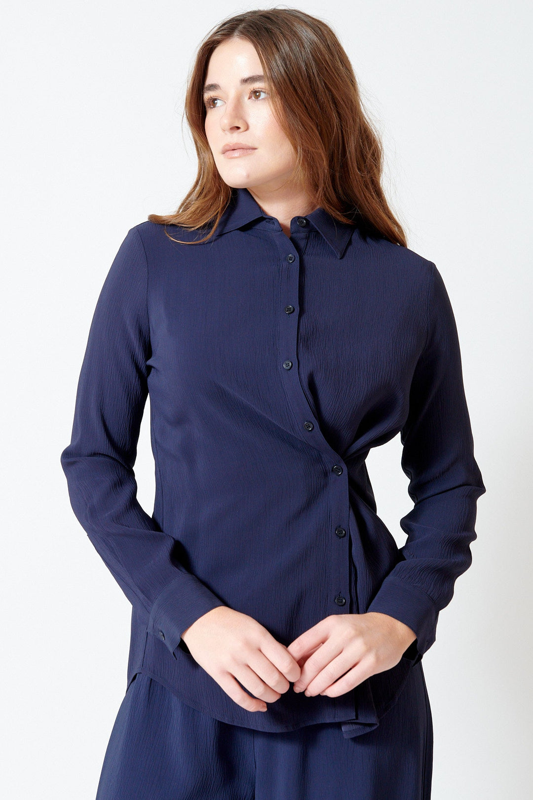 Julia wearing Apiece Apart Sodi Wrap Button Up front view
