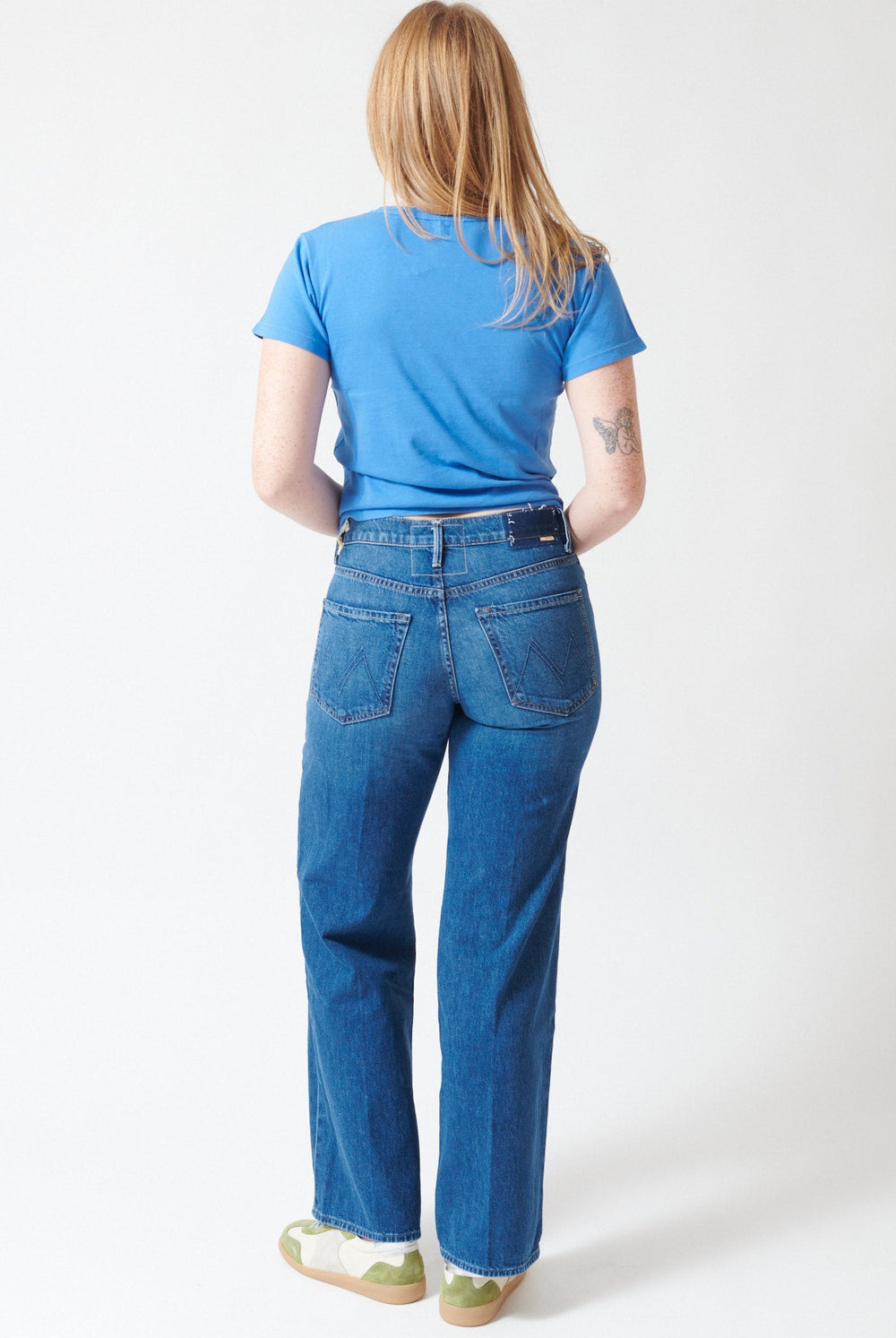 Waverly wearing Mother Denim The Mid Rise Maven Skimp rear view