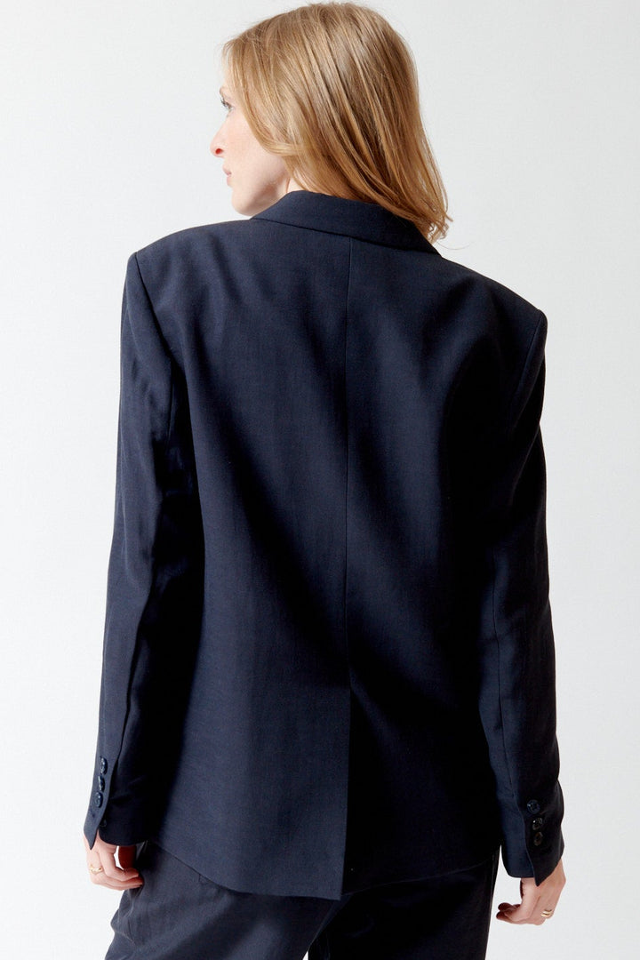 Madi wearing Dorothee Schumacher Summer Cruise Jacket rear view
