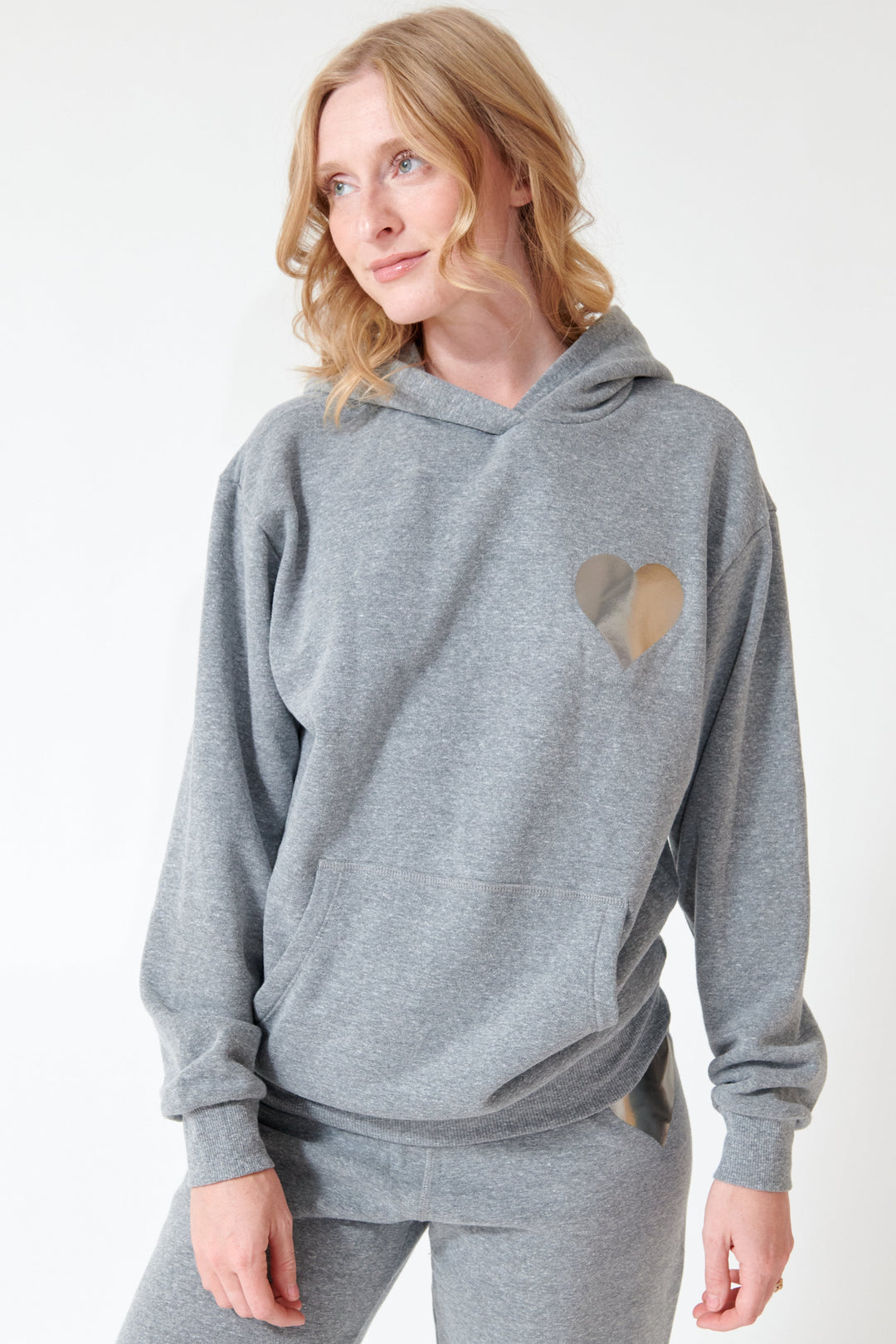 Madi earing SPRWMN Heart Hoodie front view