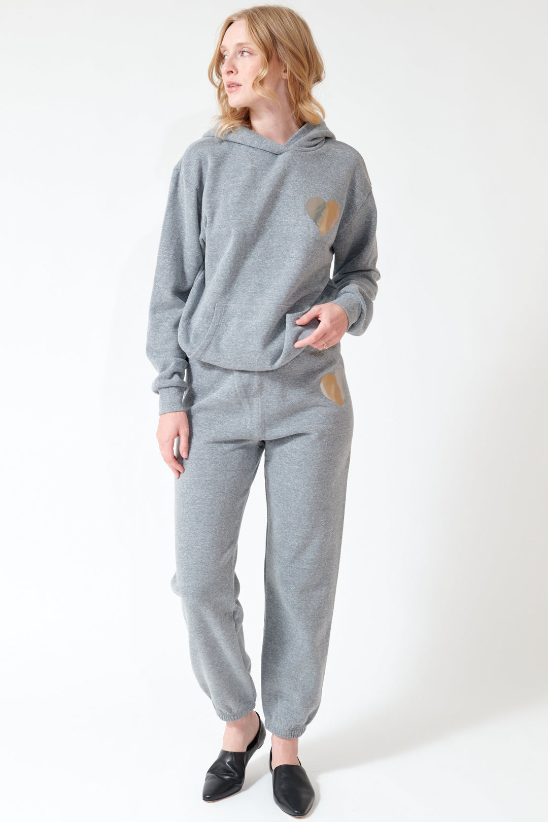 Madi wearing SPRWMN Heart Sweatpants front view