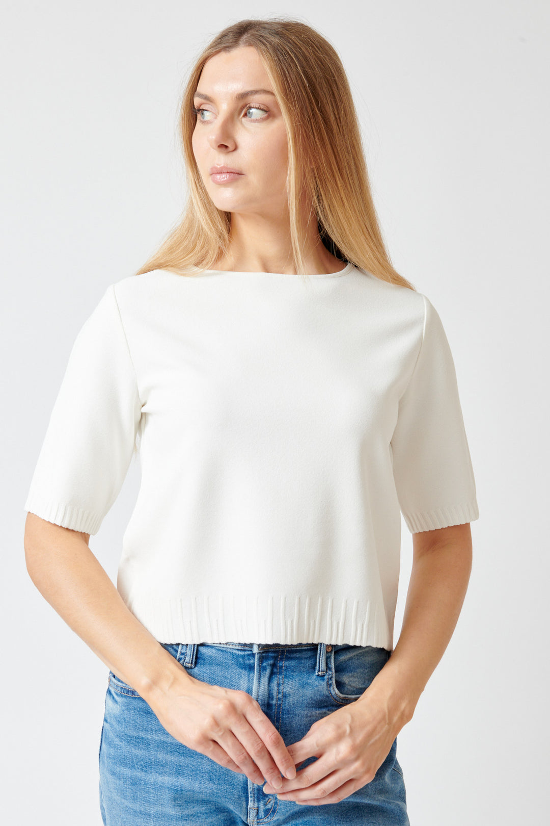 Mari wearing Base Luxury Knit Boatneck Top front view