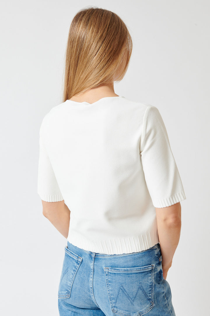 Mari wearing Base Luxury Knit Boatneck Top rear view
