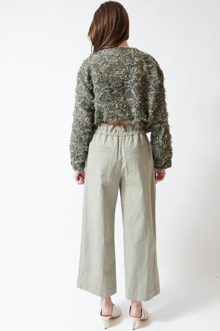 Angela wearing Odeeh Crinkled Oxford Pants rear view
