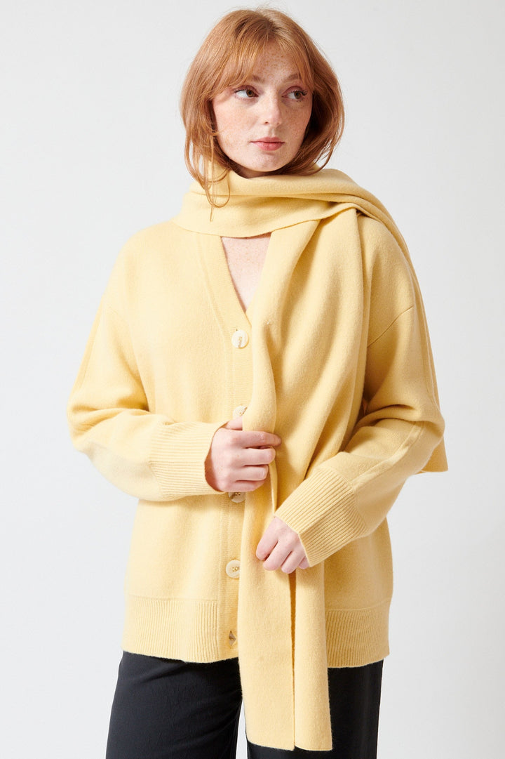 Waverly wearing Apiece Apart Medina Cardigan With Scarf front view