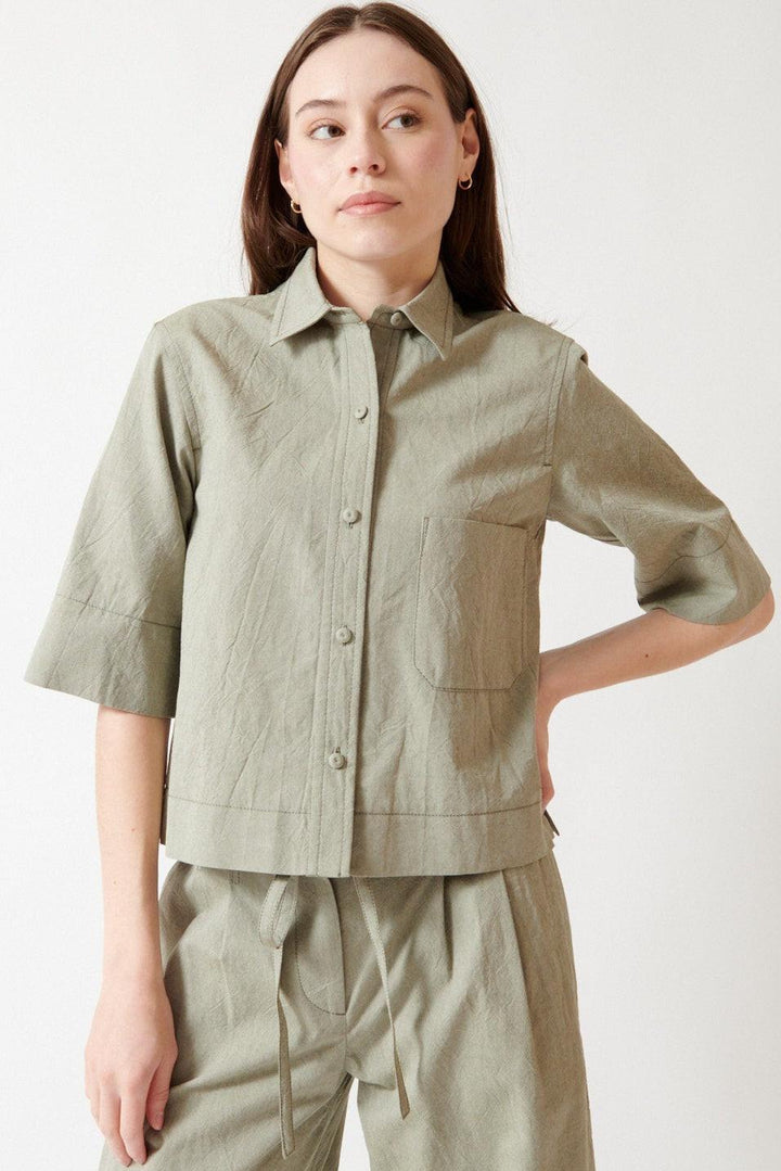 Angela wearing Odeeh Crinkled Oxford Shirt front view