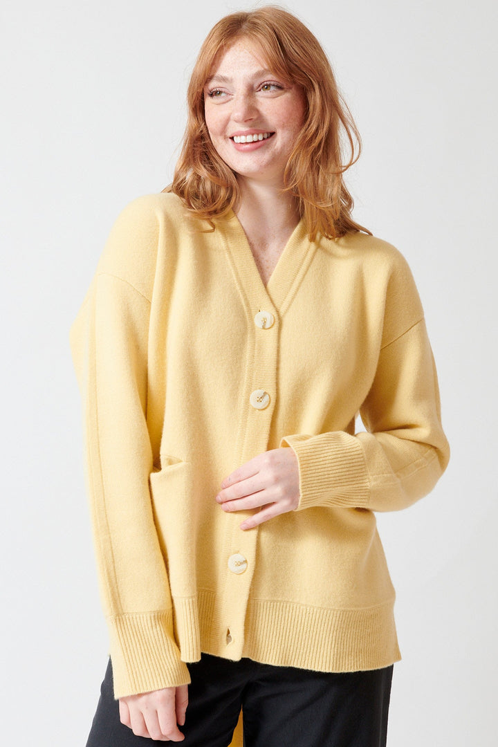 Waverly wearing Apiece Apart Medina Cardigan With Scarf front view