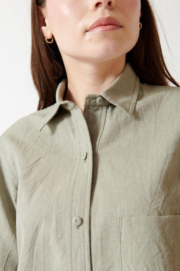 Angela wearing Odeeh Crinkled Oxford Shirt front/detail view