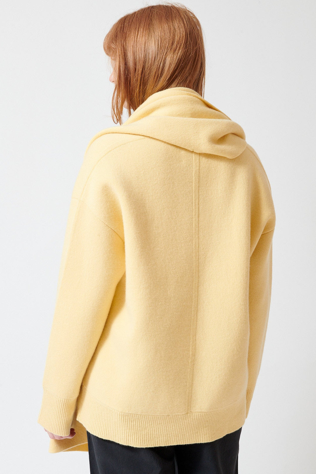 Waverly wearing Apiece Apart Medina Cardigan With Scarf rear view