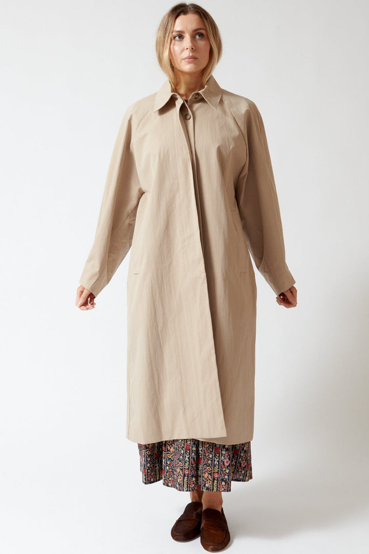 Mari wearing ELEH Split Sleeve Wing Trench front view