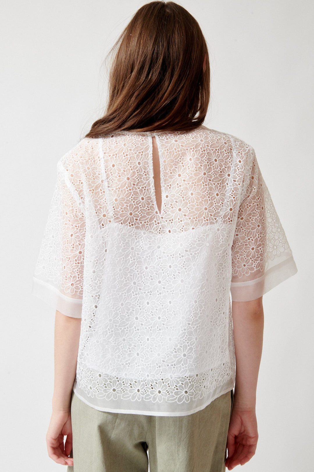 Angela wearing P.A.R.O.S.H. Shake Blouse rear view