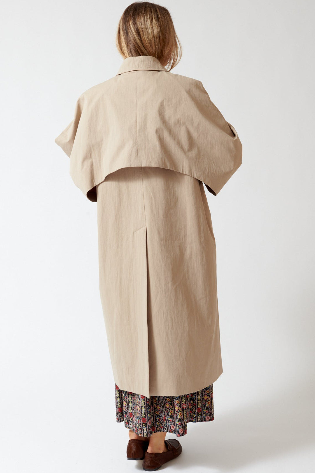 Mari wearing ELEH Split Sleeve Wing Trench rear view