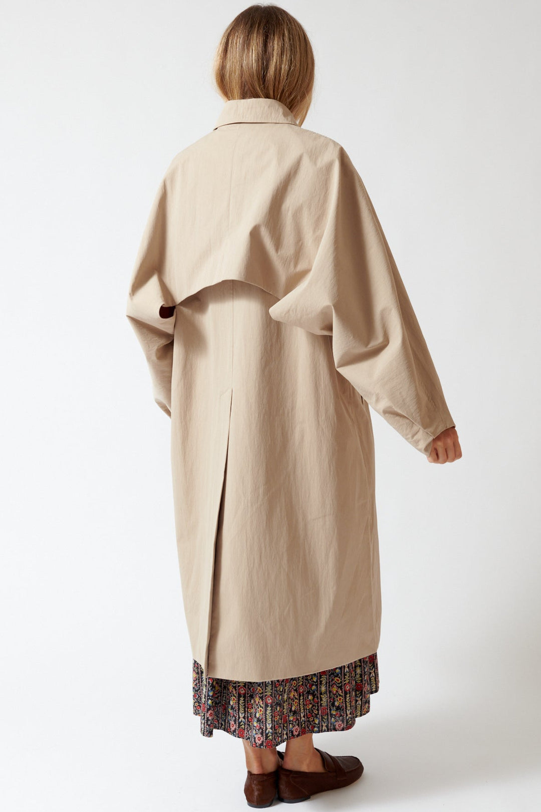 Mari wearing ELEH Split Sleeve Wing Trench rear view