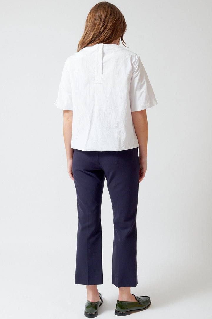 Julia wearing Odeeh Compact Jersey Side Zip Pant rear view