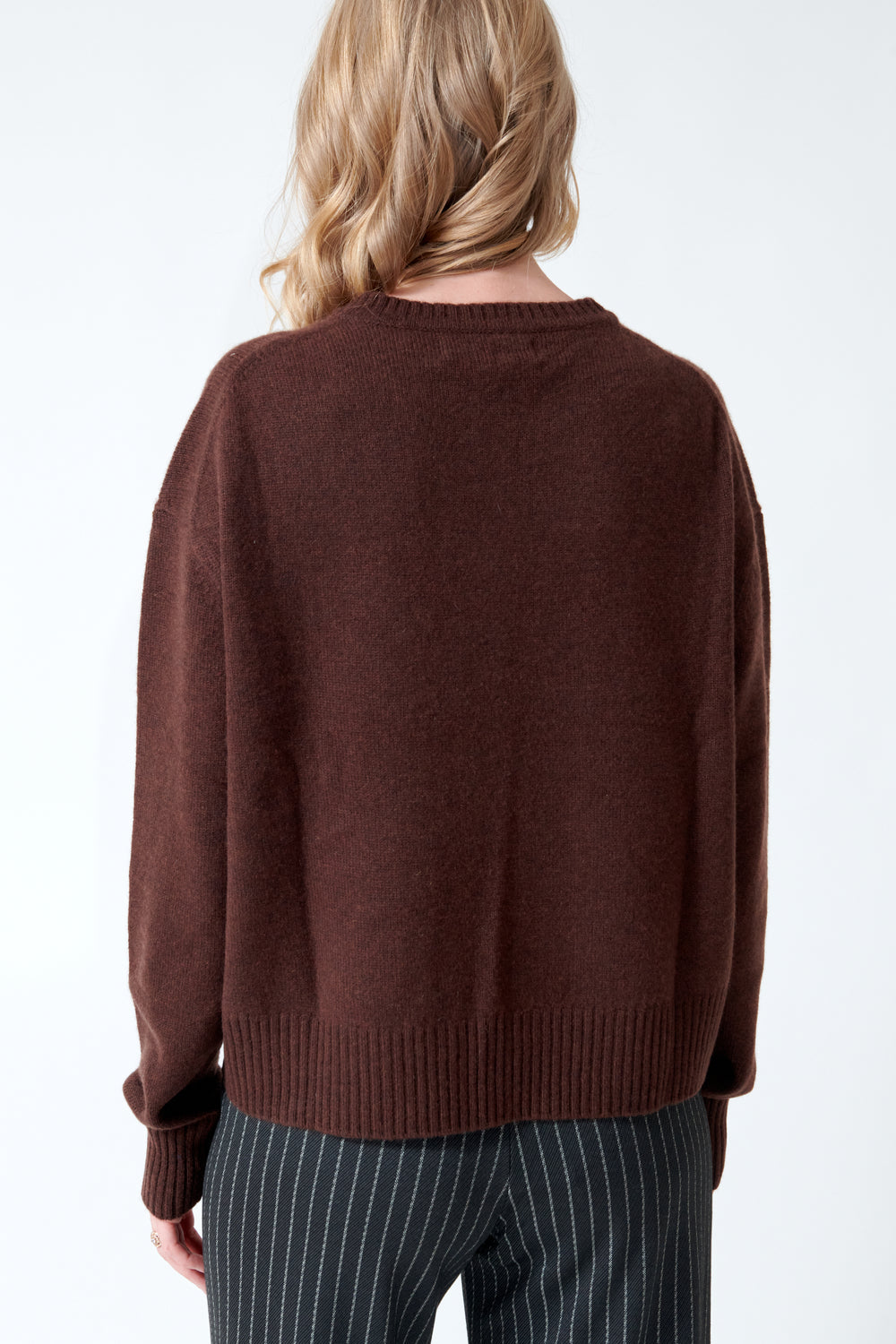 Madi wearing SPRWMN Boxy Sweater rear view