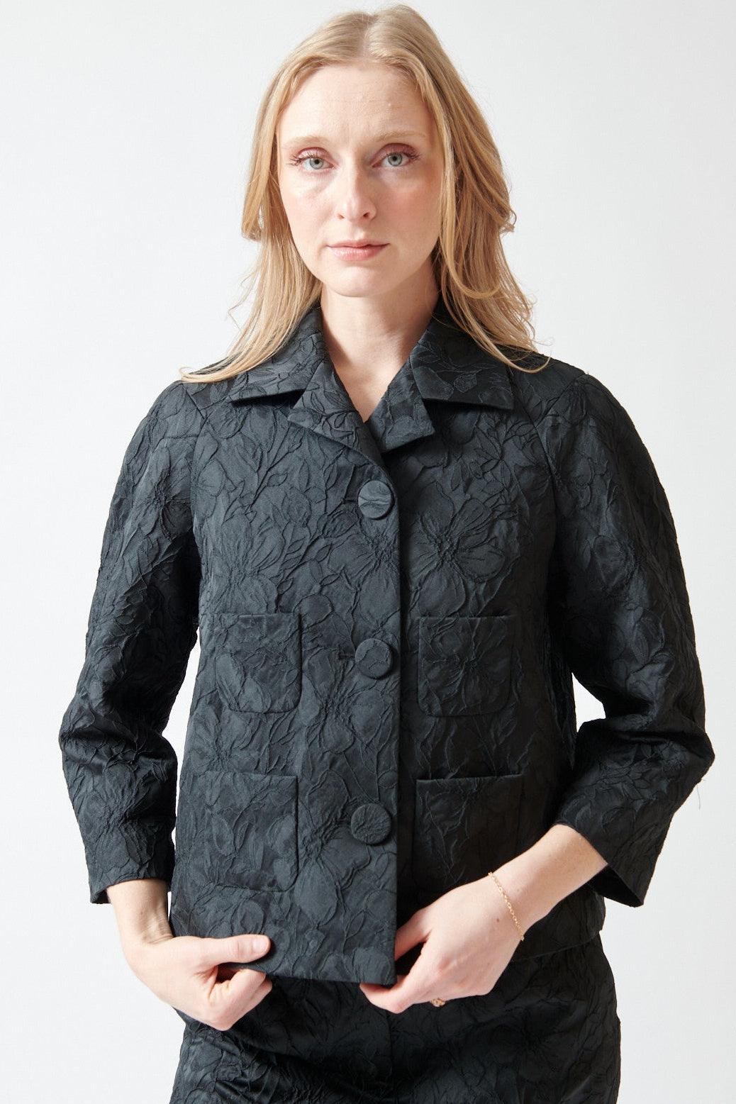 Madi wearing N°21 Textured Floral Froufrou Jacket front view