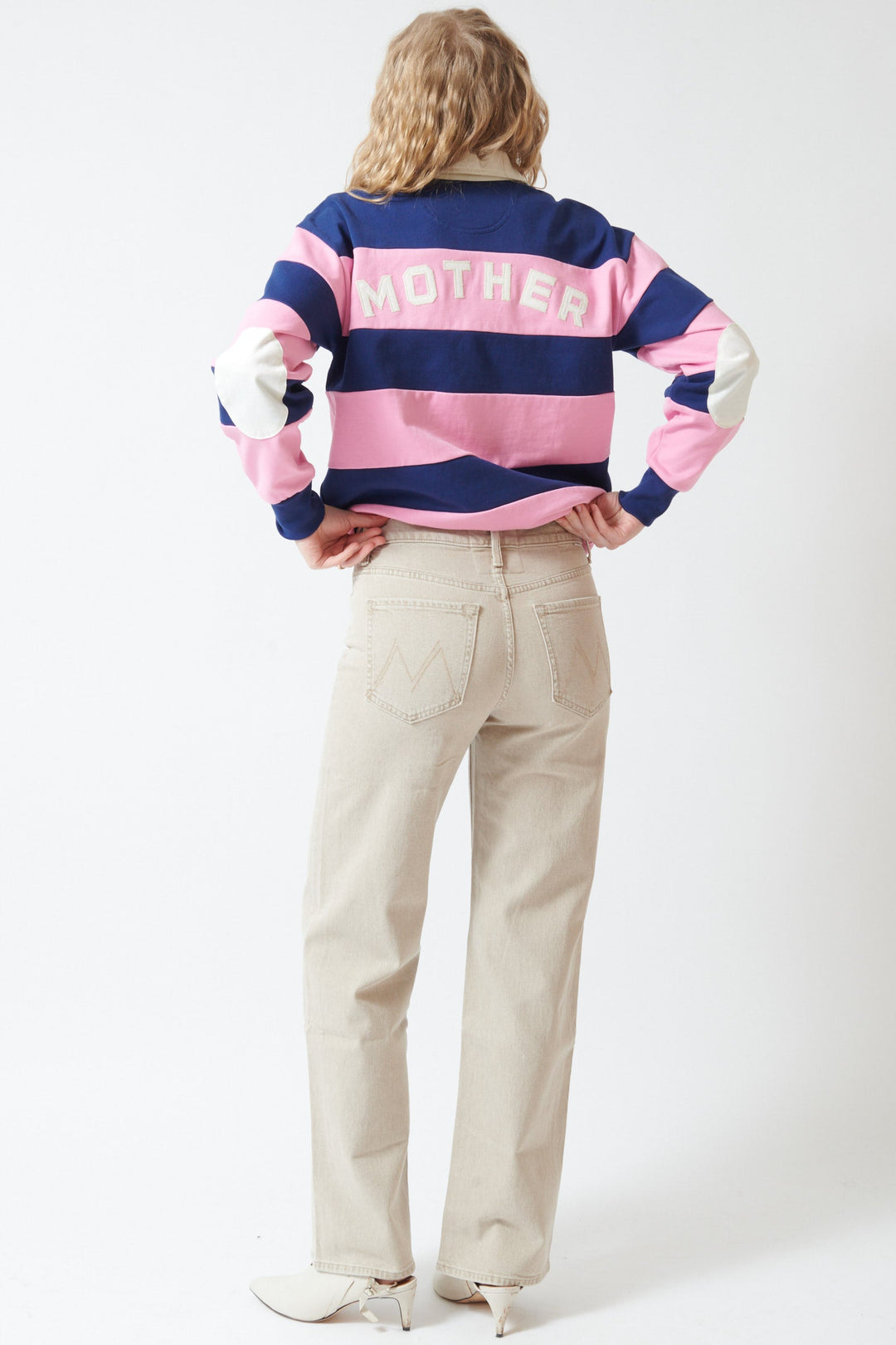 Madi wearing Mother Denim The Dodger Sneak rear view