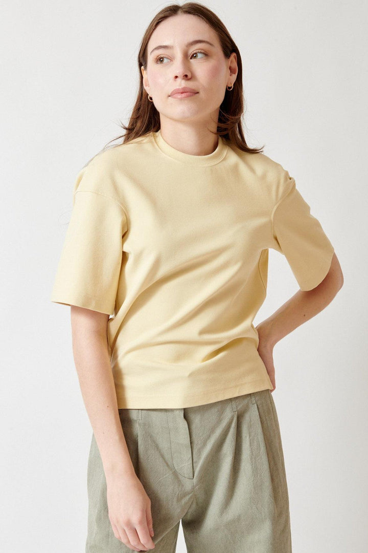 Angela wearing OSSOU Shale Tee front view