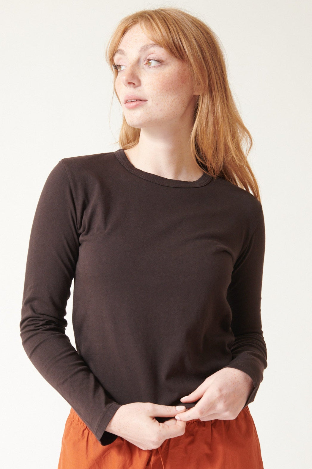 Waverly in LESET The Margo Long Sleeve Tee, brown, front view.