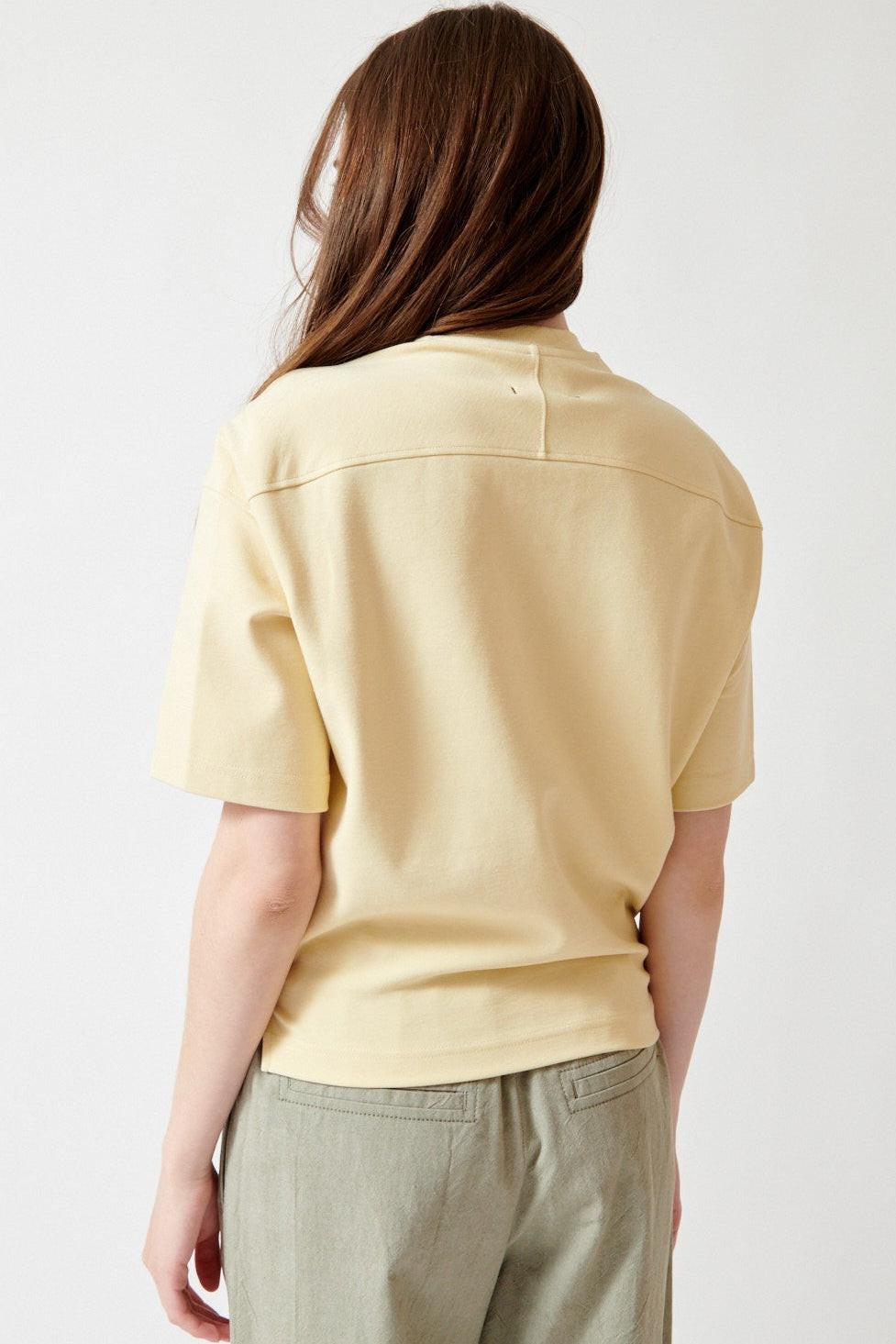 Angela wearing OSSOU Shale Tee rear view