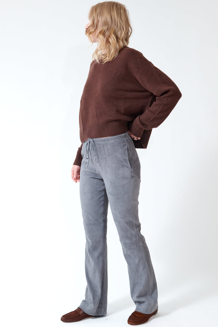 Madi wearing SPRWMN Drawstring Straight Leg Pants side/front view