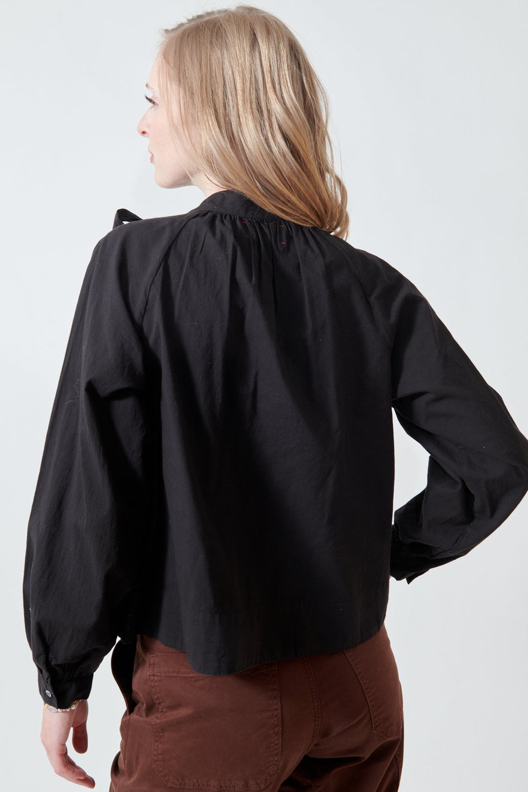 Madi wearing Xirena Leona Top rear view