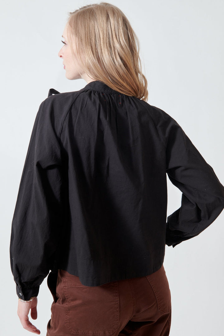 Madi wearing Xirena Leona Top rear view