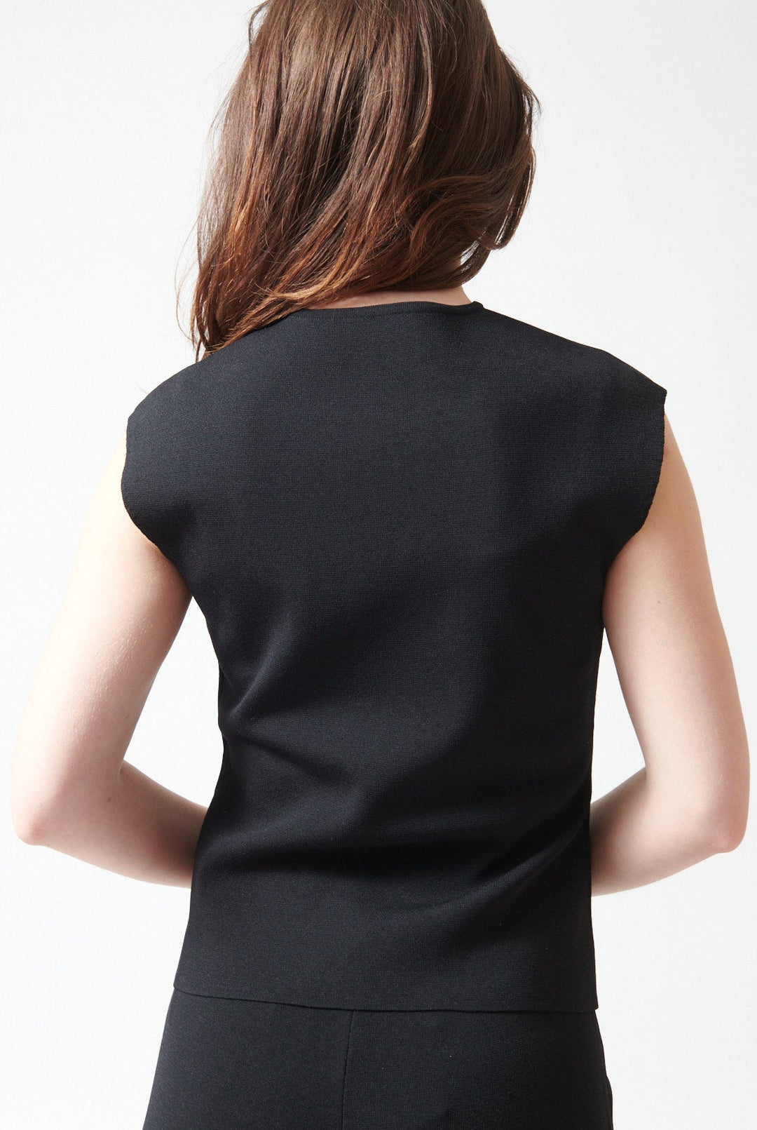 Waverly wearing P.A.R.O.S.H. Roma Knit Top rear view