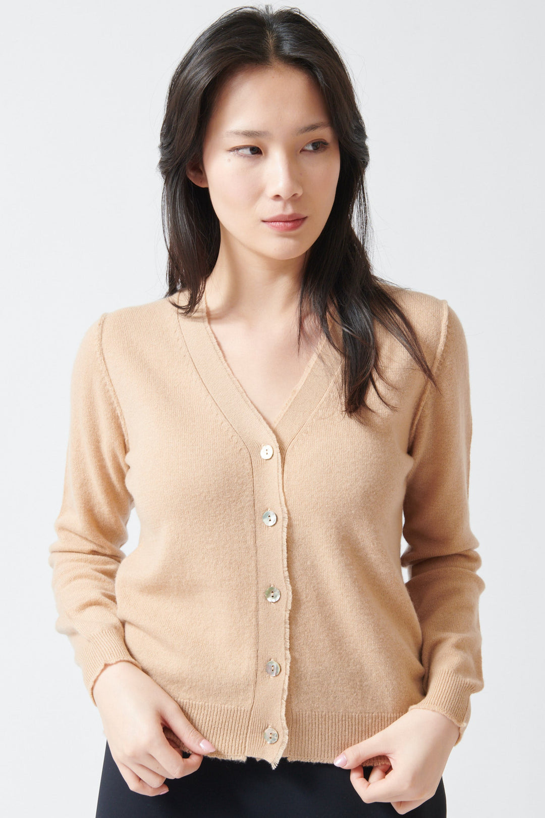 Lilly wearing Jumper 1234 Distressed Vee Cardigan front view