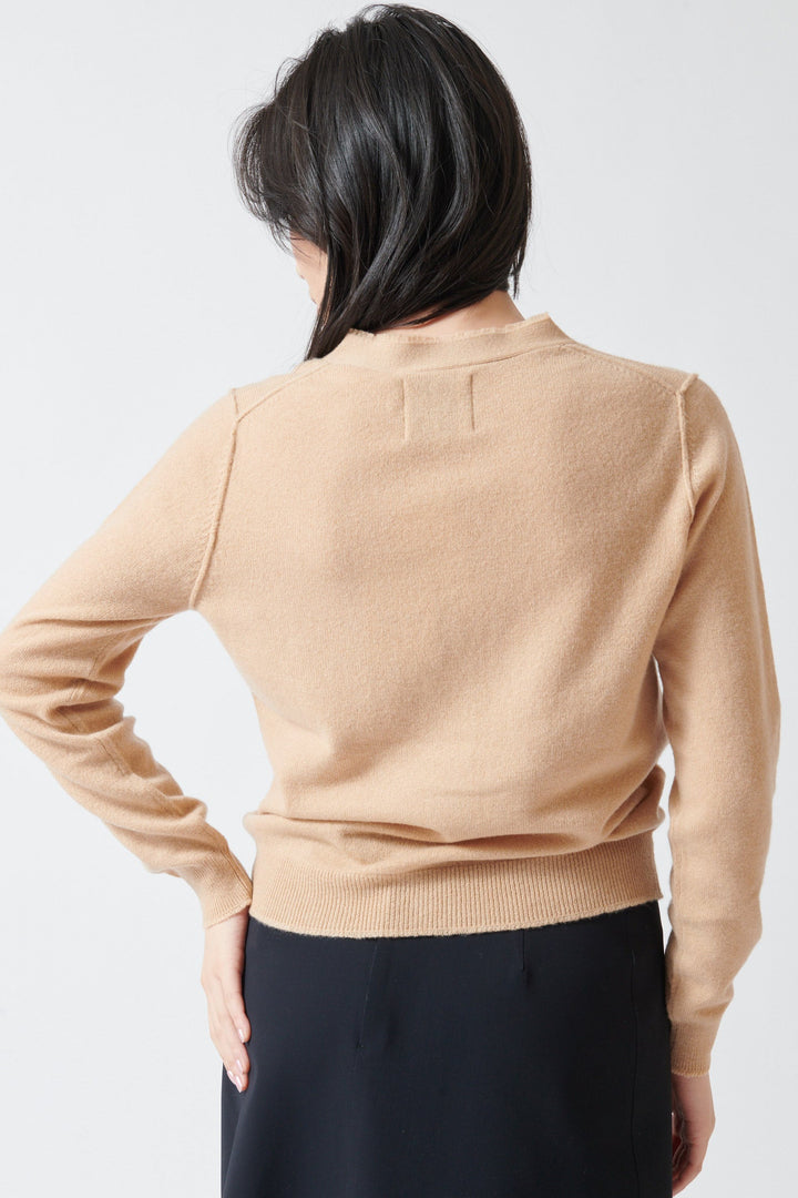 Lilly wearing Jumper 1234 Distressed Vee Cardigan rear view