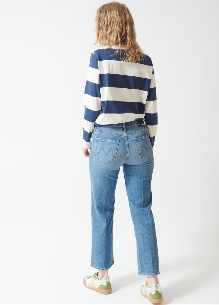 Madi wearing Mother Denim The Kick It Ankle rear view