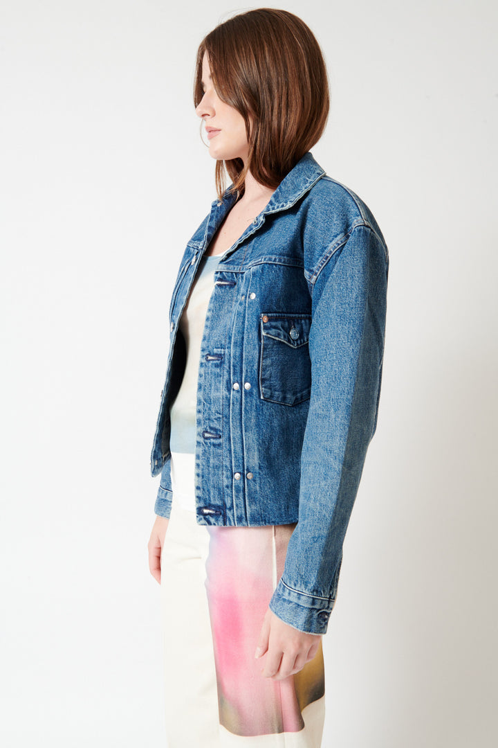 Julia wearing Tanaka The Jean Jacket front/side view