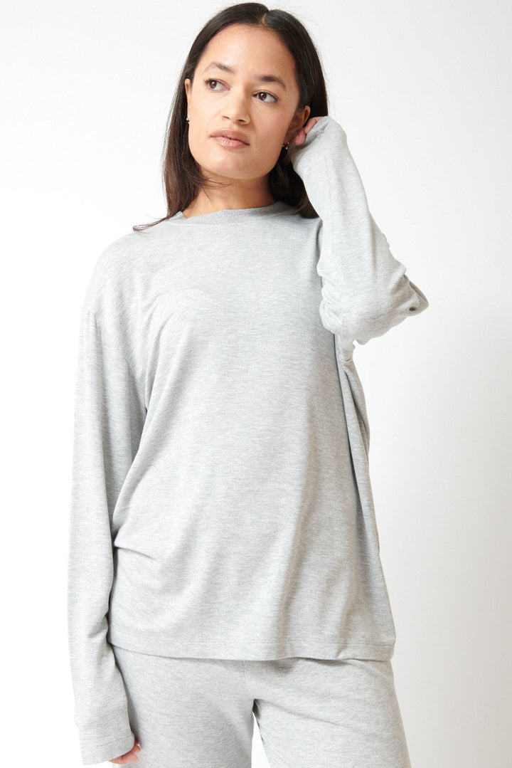 Amanda wearing SPRWMN Long Sleeve Oversized Tee front view
