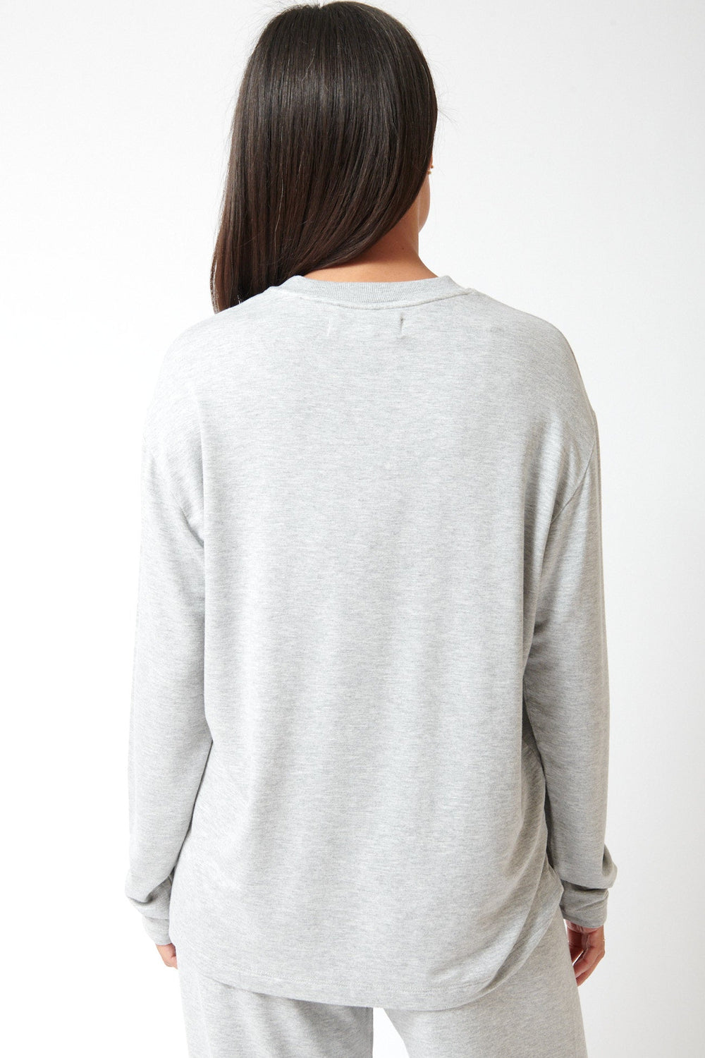 Amanda wearing SPRWMN Long Sleeve Oversized Tee rear view