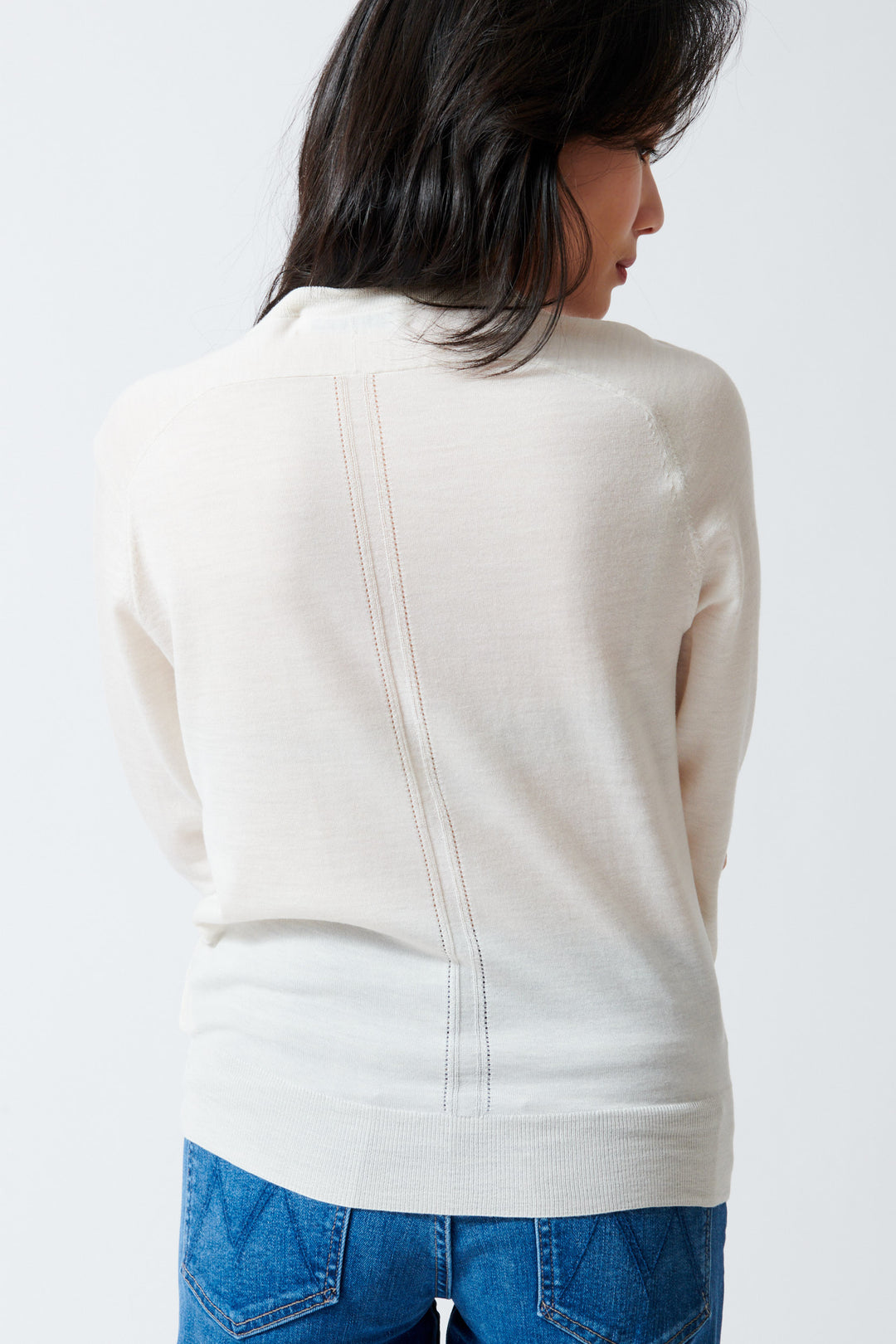 Lilly wearing White + Warren Superfine Merino Wool V Neck rear view