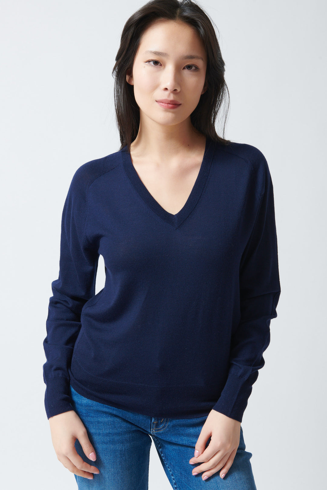 Lilly wearing White + Warren Superfine Merino Wool V Neck front view