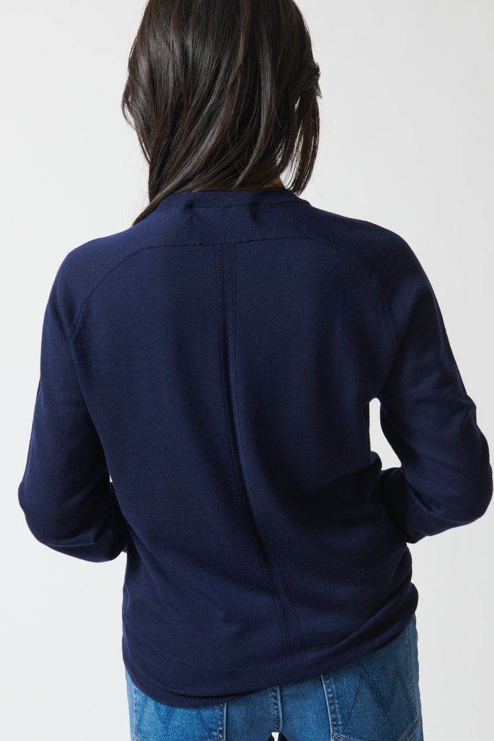 Lilly wearing White + Warren Superfine Merino Wool V Neck rear view