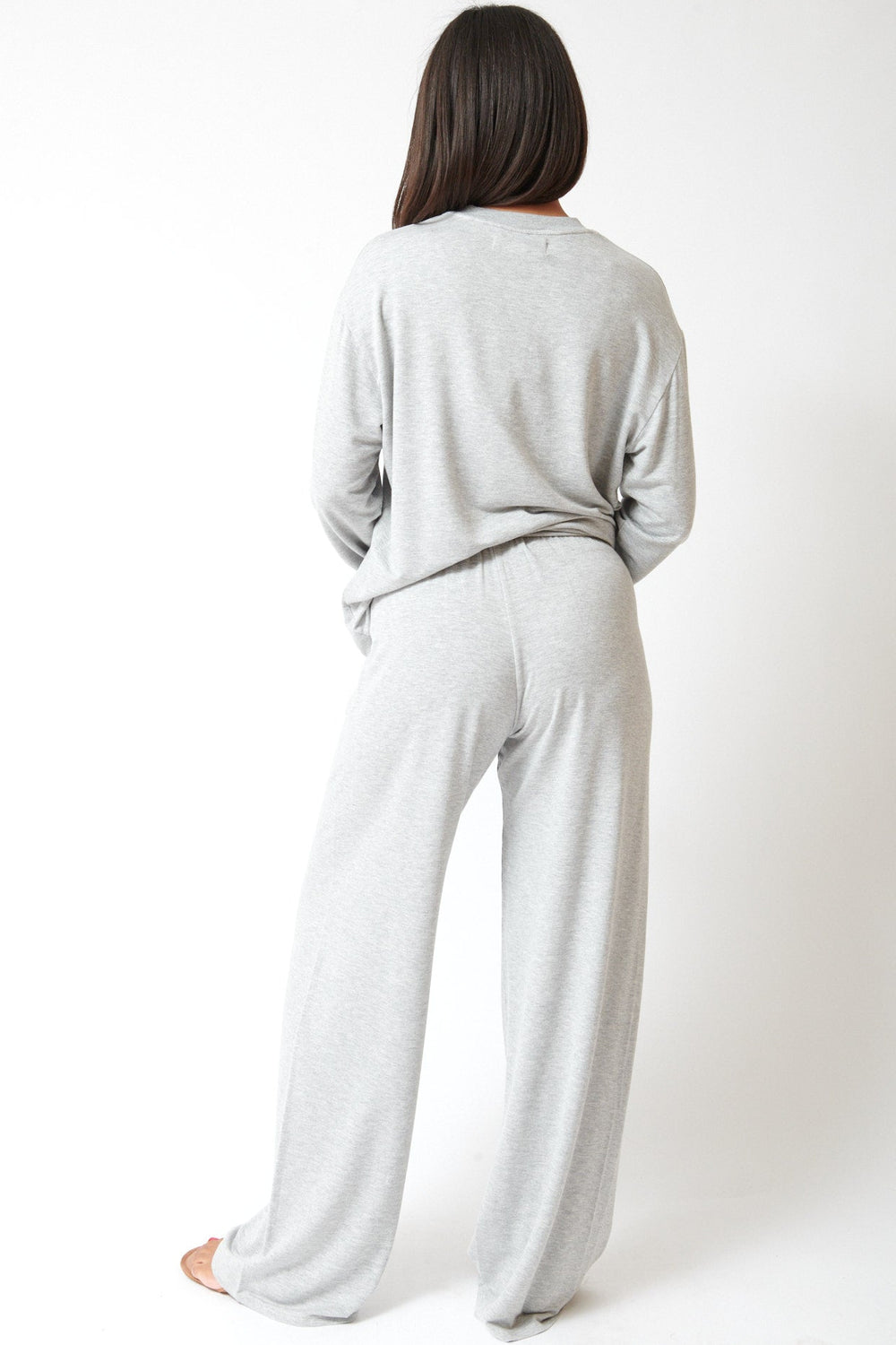 Amanda wearing SPRWMN Wide Leg Easy Pants rear view
