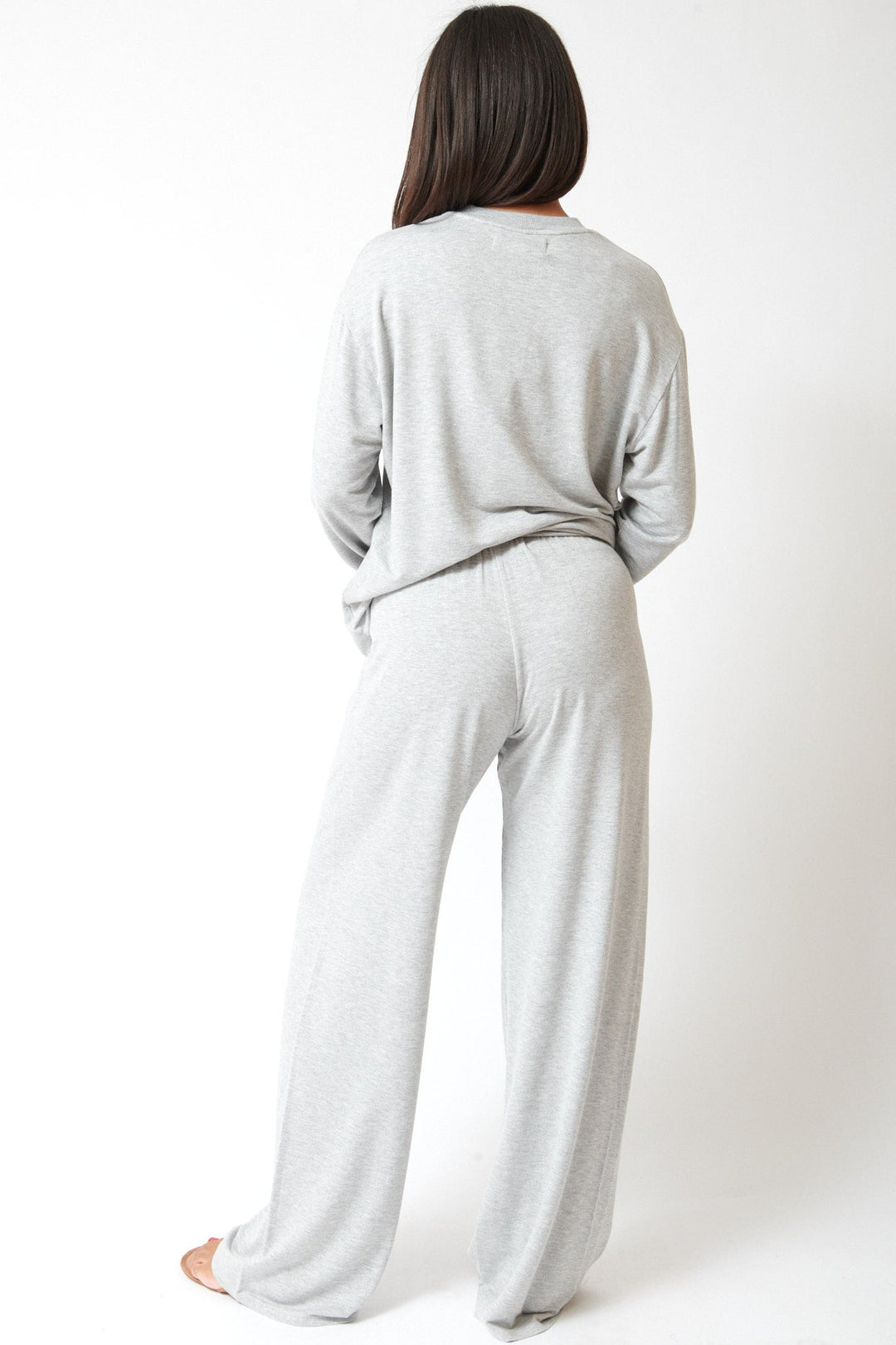 Amanda wearing SPRWMN Wide Leg Easy Pants rear view