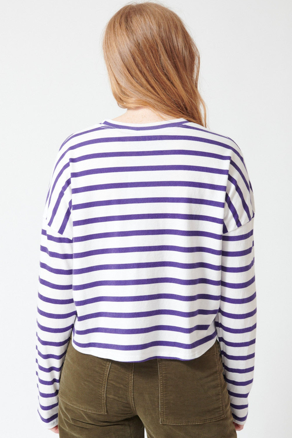 Waverly in ASKK NY Cropped Long Sleeve Stripe Tee, white thin stripe, rear view.