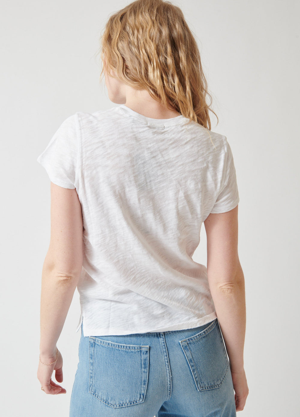 Madi wearing ATM Anthony Thomas Melillo School Boy Crewneck Tee rear view