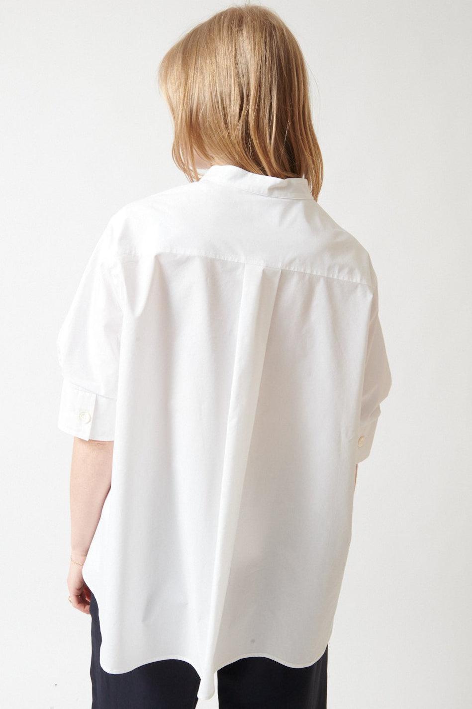 Madi wearing Mantu Kathleen V Neck Blouse rear view
