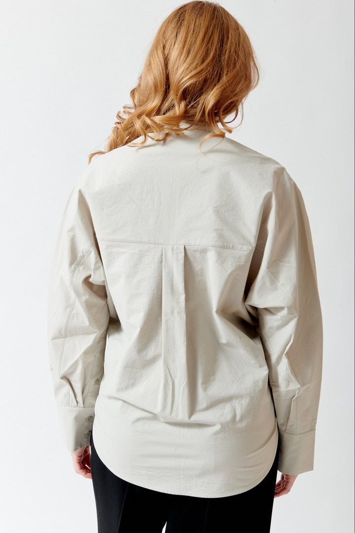 Waverly wearing Christian Wijnants Tubi Shirt rear view