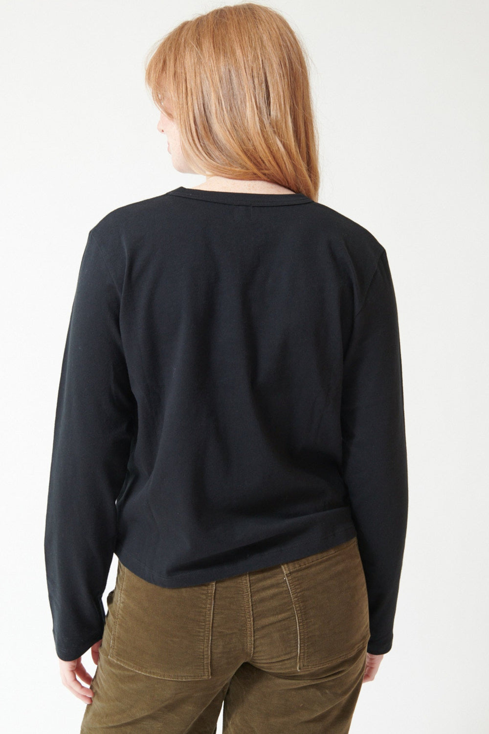 Waverly wearing LESET The Margo Long Sleeve Tee rear view
