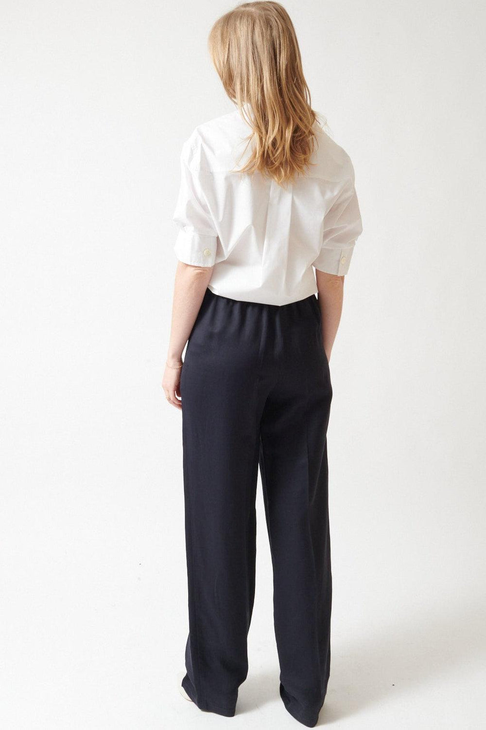 Madi wearing Mantu Teri Jogger Trousers rear view